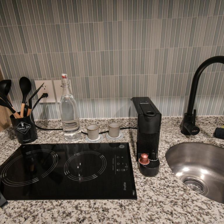 Expo Satelite 2750 Hotel & Suites - Standard Studio - 10