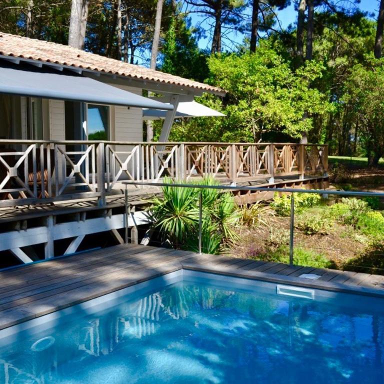 Villa avec piscine sur le golf entre lac et Océan - Villa avec Piscine Privée - 21