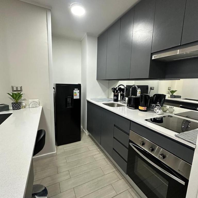 Hermoso Departamento cerca de MOVISTAR ARENA - One-Bedroom Apartment - 5