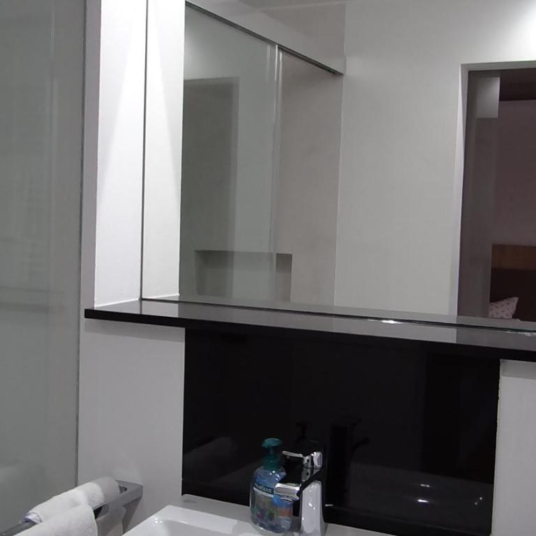 Gästehaus Bühler - Doppelzimmer mit Bergblick - 11