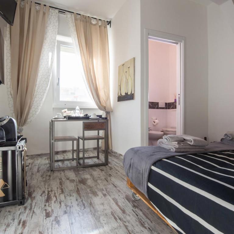 Letto e Latte Roma Guest House - Camera Matrimoniale/Doppia con Letti Singoli con Bagno Privato - 9