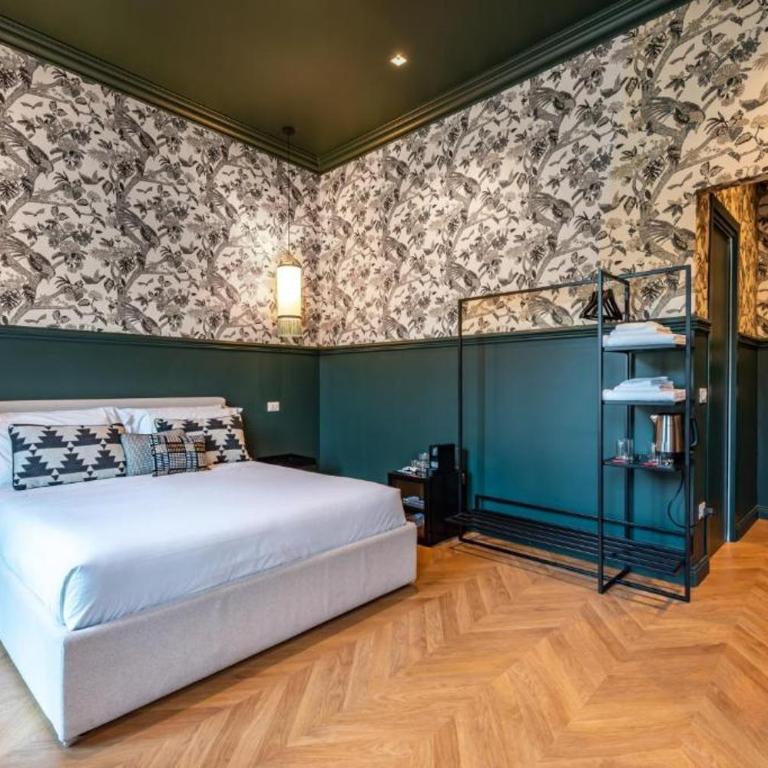 Voluta Suites - Junior Suite Tripla con Balcone - 1