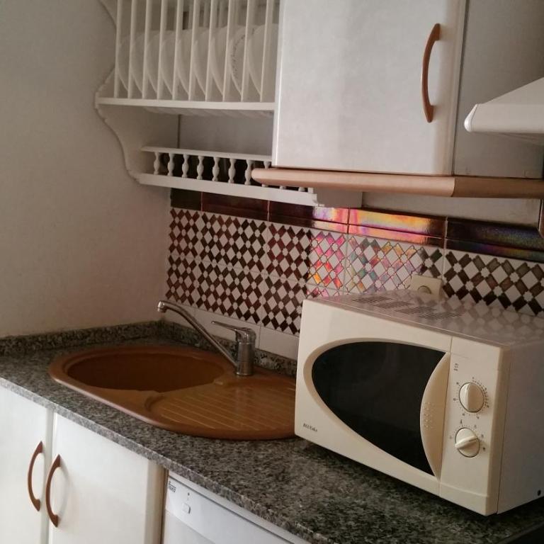 Apartamento Atlanterra Playa - Apartamento de 2 dormitorios con vistas al jardín - 10