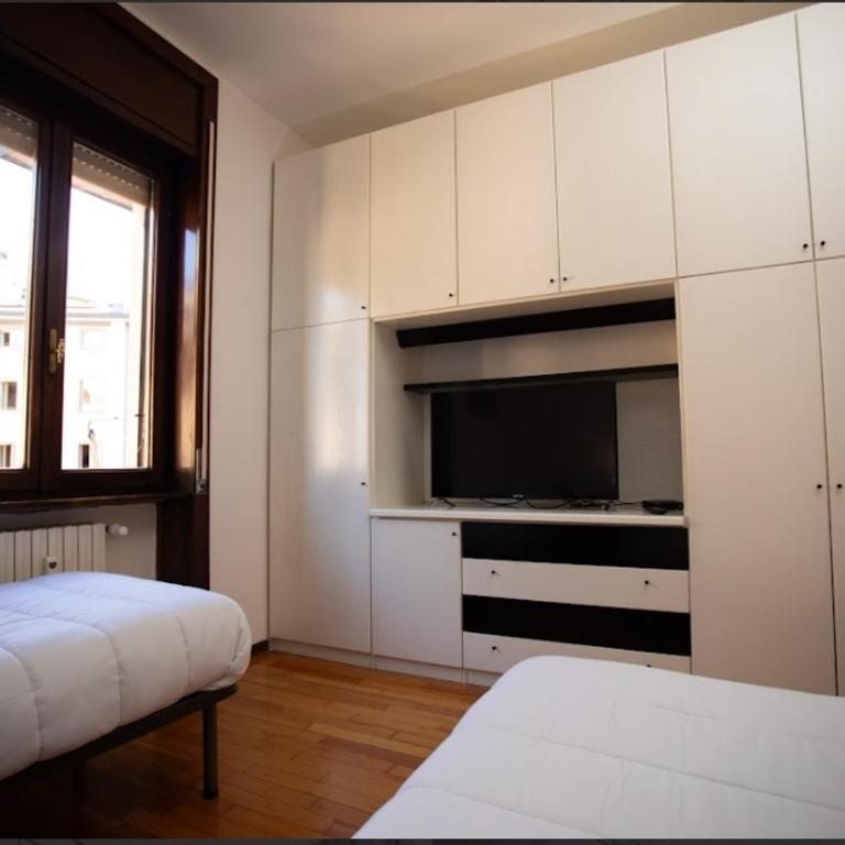 SOFI HOME BERGAMO - Camera Quadrupla con Bagno in Comune - 17