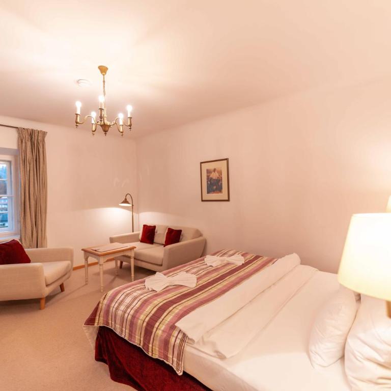Geldernhaus Hotel garni - Zimmer mit Queensize-Bett und Gartenblick - 4