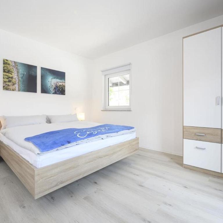 Enzian Apartments - Apartment mit 3 Schlafzimmern - 10