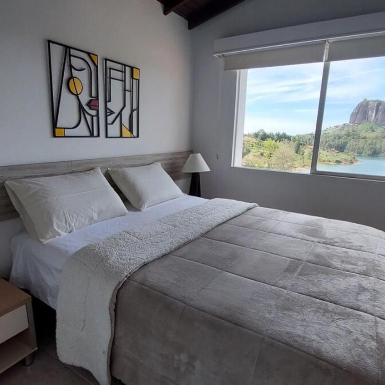 Finca Con Hermosa Vista a la Piedra del Peñol y Jacuzzi Grande - Villa - 15