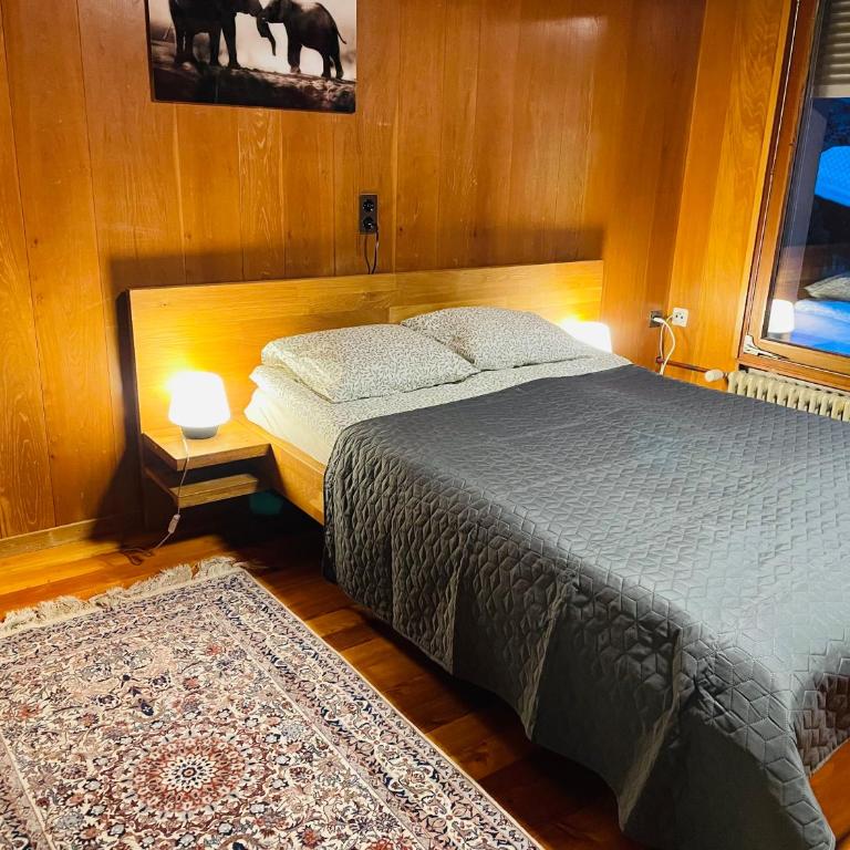 5 Zimmer-Wohnung mit Garage und Sauna - Apartment mit 3 Schlafzimmern und Bergblick - 35