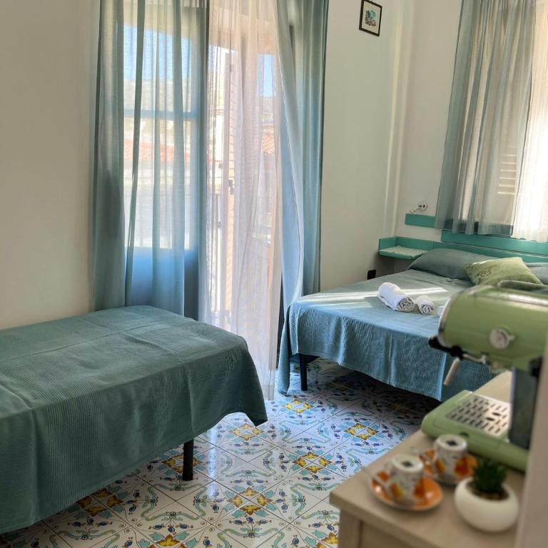 Casa Vacanze Central Cincotta - Camera Tripla Comfort - 1