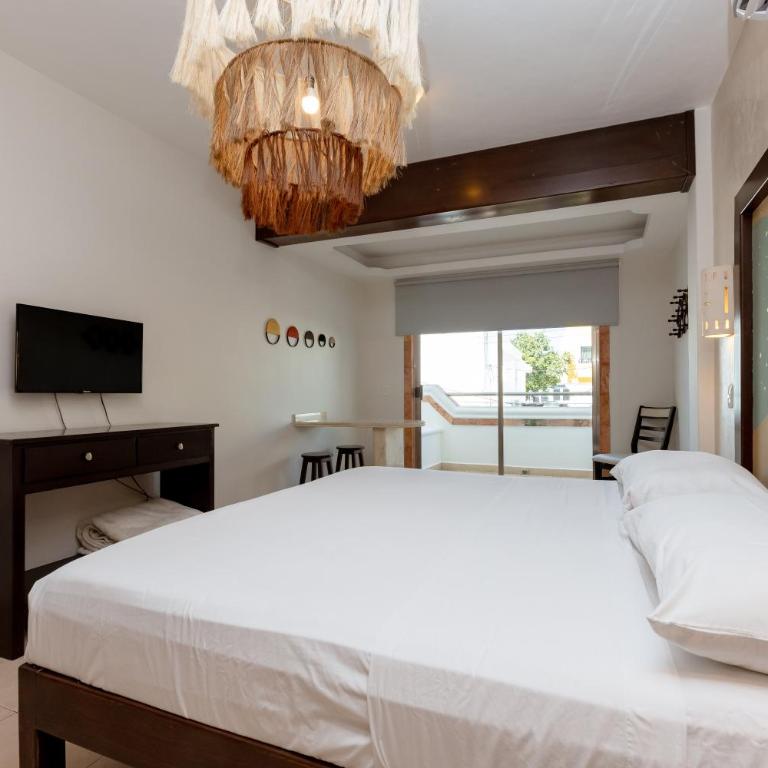 Hotel Kinich - Habitación Deluxe con terraza o balcón - Cama extragrande - 11
