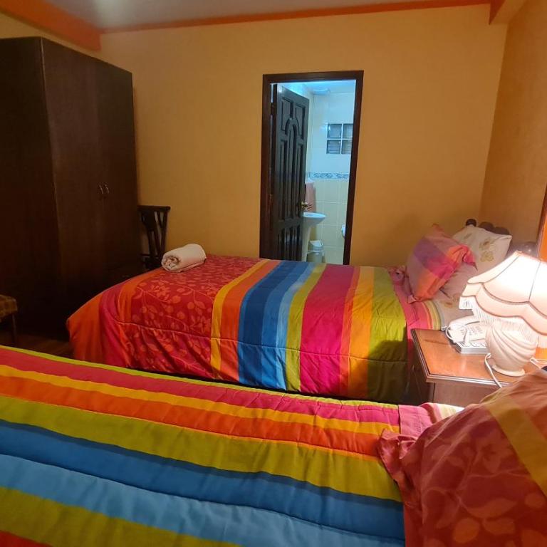 Hostal Montañes - Habitación Doble con baño privado - 2 camas - 21