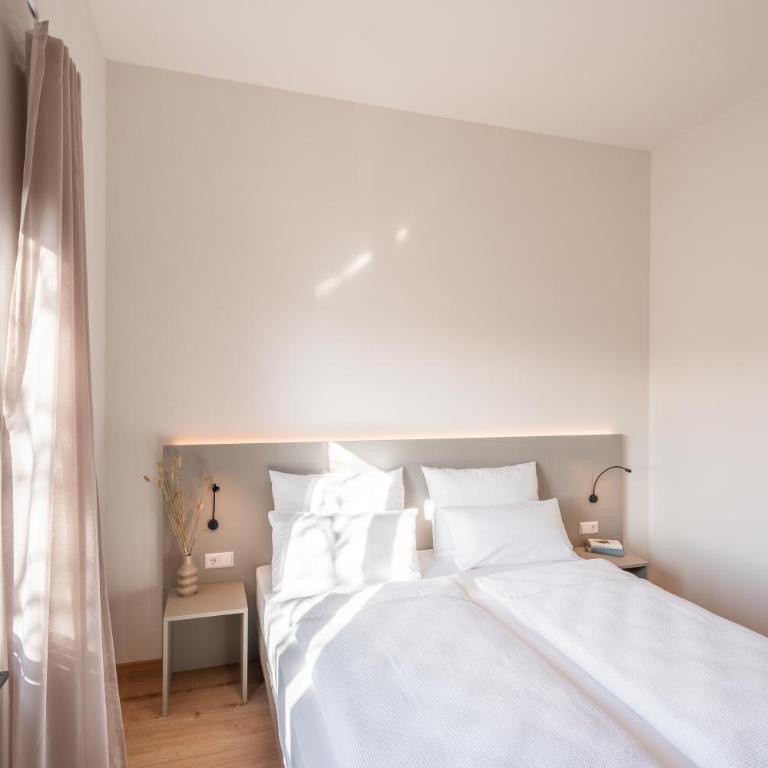 AmRain Boardinghouse - Doppelzimmer mit Gartenblick - 4