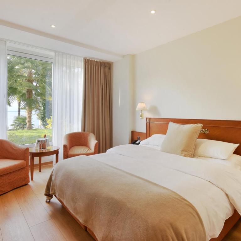 Golf Hotel René Capt - Standard Doppelzimmer mit seitlichem Seeblick - 3