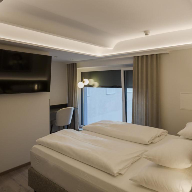 Hotel Schwarzer Bär - Deluxe Zimmer mit Queensize-Bett - 8