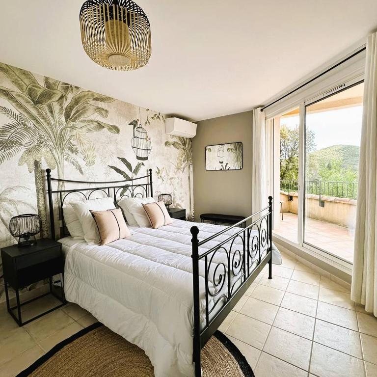 Villa Marguerite pour 10 personnes avec climatisation et vue mer avec piscine privée et chauffée à La Londe-les-Maures - Maison de Vacances 4 Chambres - 32
