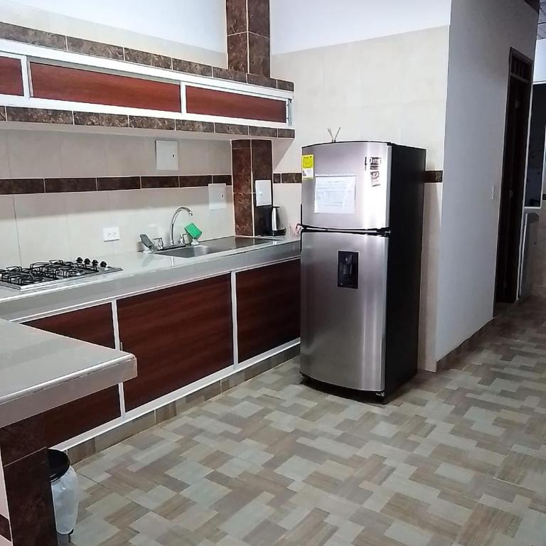 CÓMODO APARTAMENTO CENTRAL EN BARRIO SEMI RURAl - Apartamento de 2 dormitorios - 54