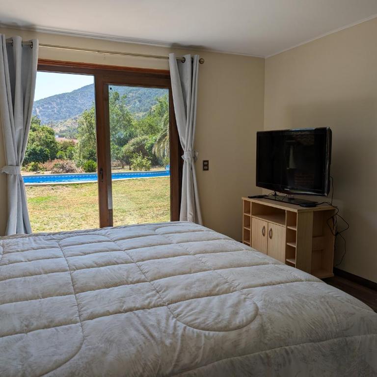 Linda casa en Olmue con amplia piscina y jardín - Three-Bedroom House - 23