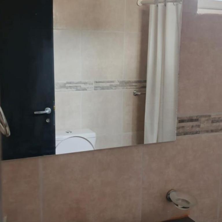 Casa y Departamento en Centenario - Apartamento de 1 dormitorio - 2