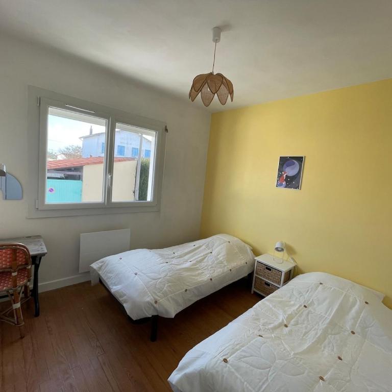 Maison calme à un 15min à pied de la plage - Three-Bedroom House - 7