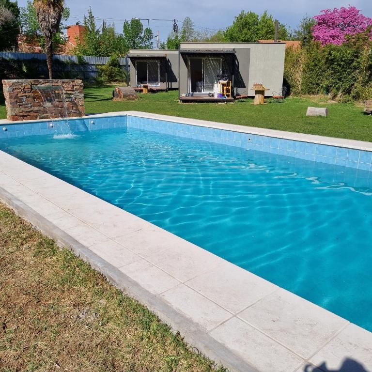 MiniCasas Modulares - Suite con cama grande y vistas a la piscina - 1