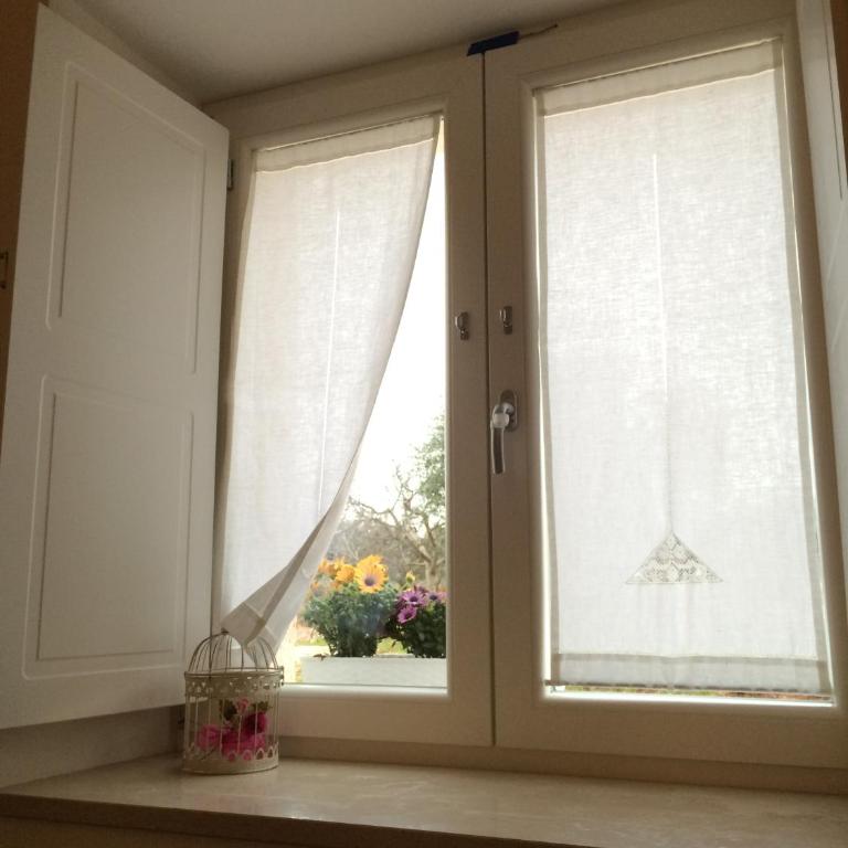 Marinella Suite Home - Camera Tripla con Vista Giardino - 7
