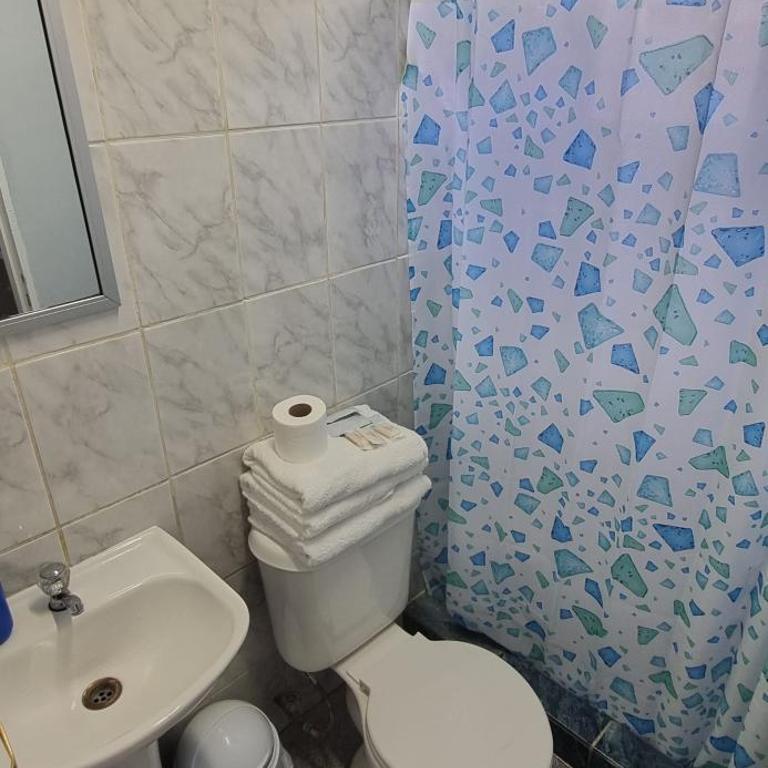 Hostal Amunategui- Sucursal Aguirre - Triple Room with Private Bathroom - 2