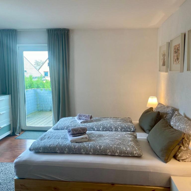 urbanAPARTMENTS Memmingen - mit Küche & Parkplatz - Apartment mit 3 Schlafzimmern und Balkon - 12