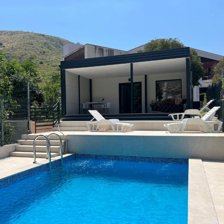 Ema - Two-Bedroom House - 1