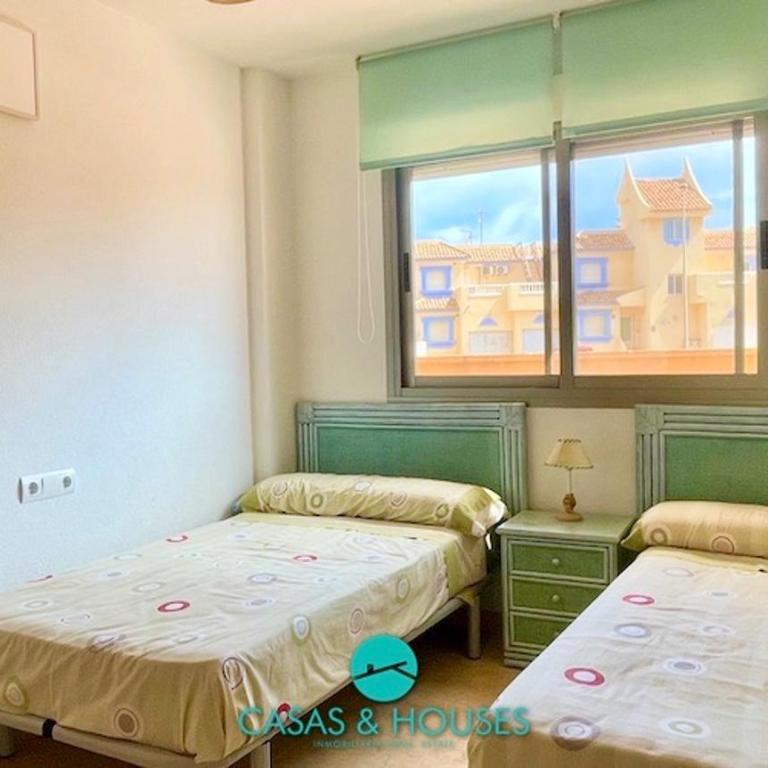 La Manga.UrbPuerto Escondido. Bajo Dos Dormitorios - Apartamento de 3 dormitorios - 48
