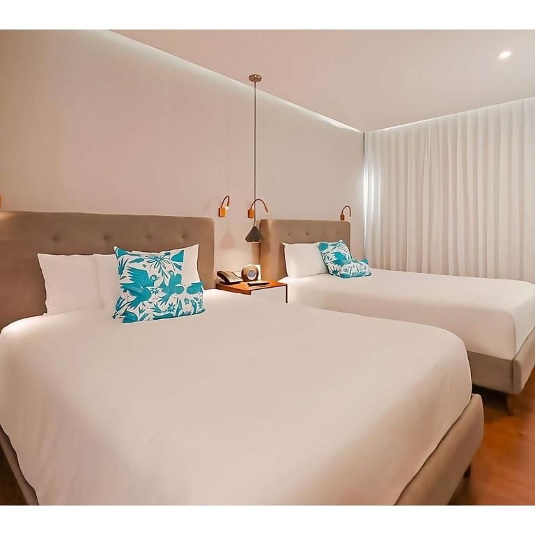 The Fives Downtown Hotel & Residences, Curio Collection by Hilton - Deluxe Room with Tow Double Beds - Courtyard View - 2