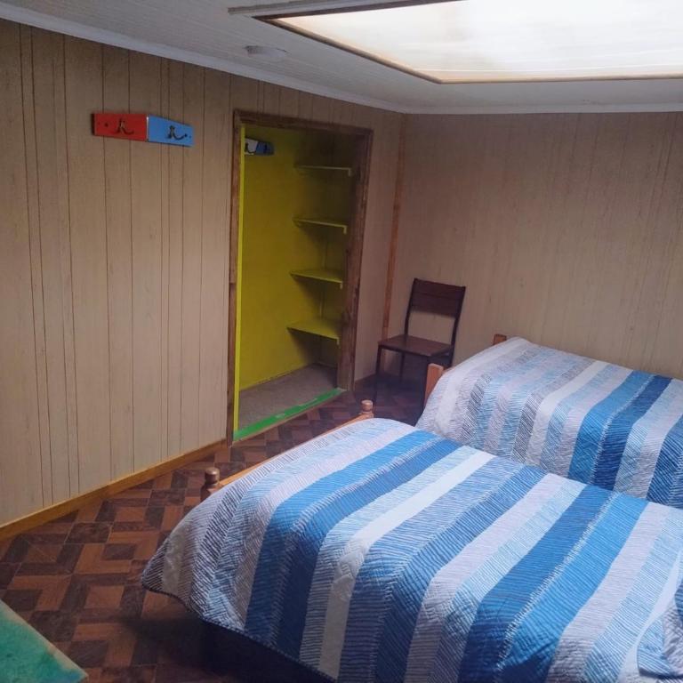 Hostal y Residencial El Mundial - Habitación Doble - 2 camas - 1