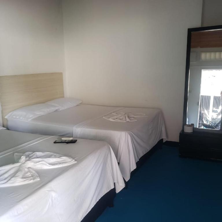 Hotel Orilla Del Mar - Habitación Doble con baño privado - 2 camas - 2