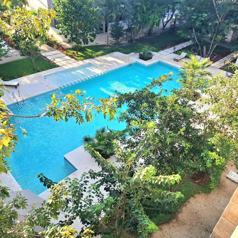 Departamento con piscina, en zona tranquila, a 12 minutos de la playa! - Apartamento de 3 dormitorios - 2