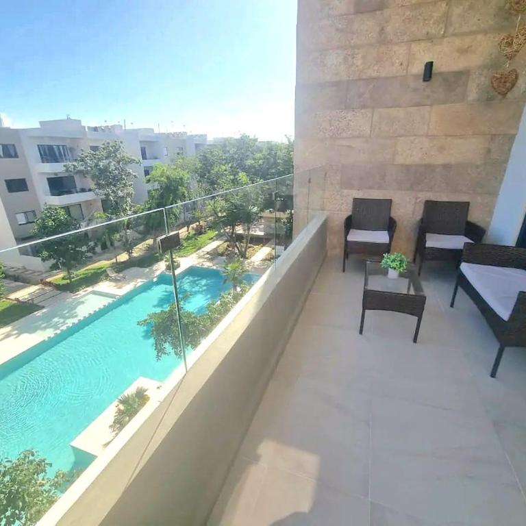 Departamento con piscina, en zona tranquila, a 12 minutos de la playa! - Apartamento de 3 dormitorios - 5