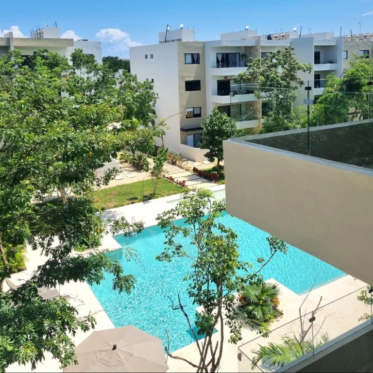 Departamento con piscina, en zona tranquila, a 12 minutos de la playa! - Apartamento de 3 dormitorios - 13