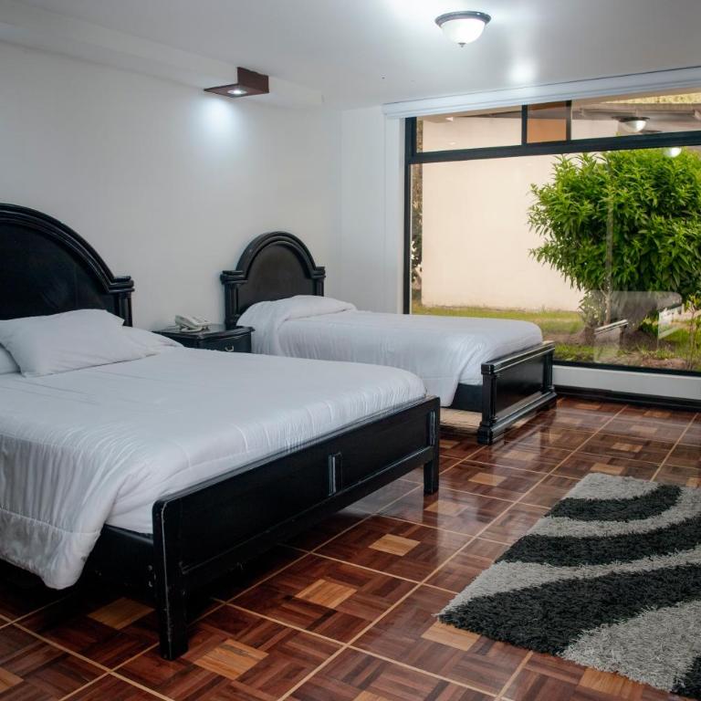Hostería El Prado - Habitación Doble - 2 camas - 4