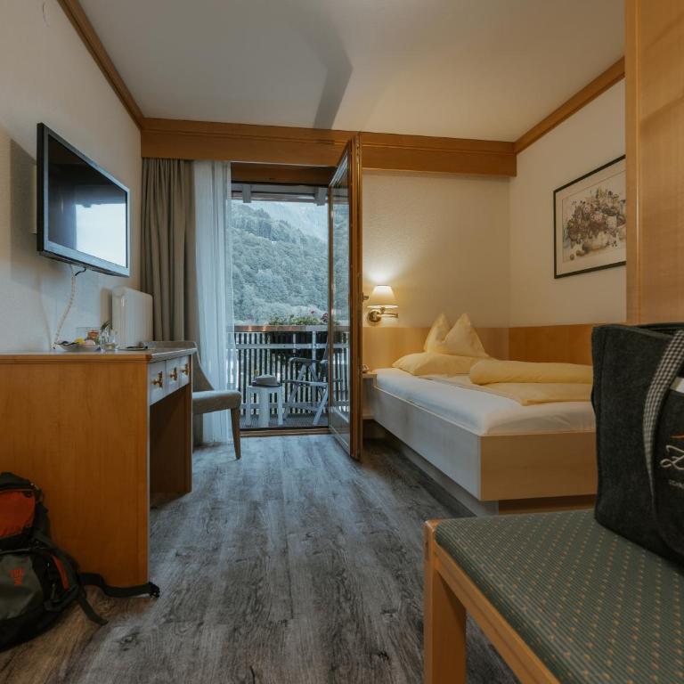 Hotel Zimba - Comfort Einzelzimmer mit Bergblick und Balkon - 2