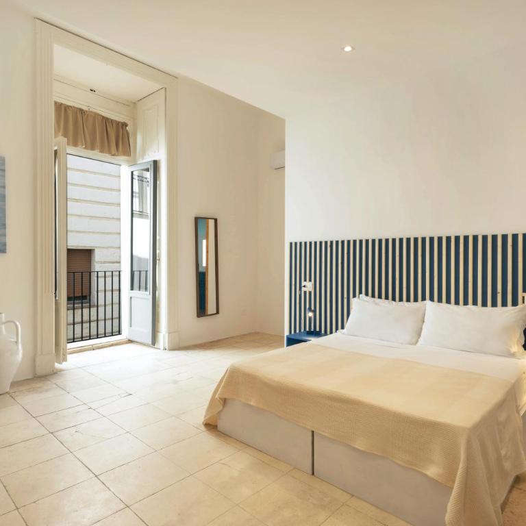 Palazzo Kapece - Camera Deluxe Matrimoniale/Doppia con Letti Singoli con Vista Città - 1