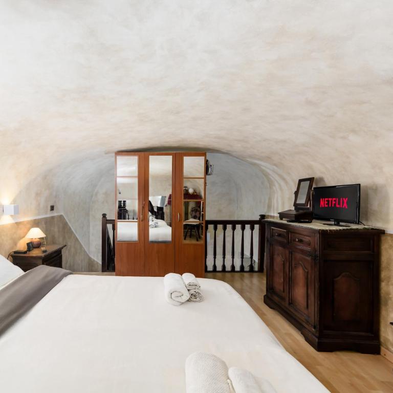 Accogliente alloggio nel pieno centro storico della città parcheggio in box privato incluso - Appartamento con 1 Camera da Letto - 6