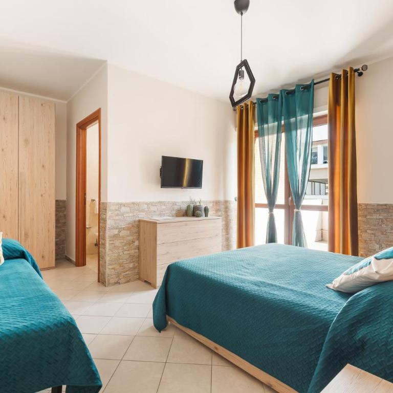 Giramondo Guest house - Deluxe Room (2 Adults + 1 Child) - 2