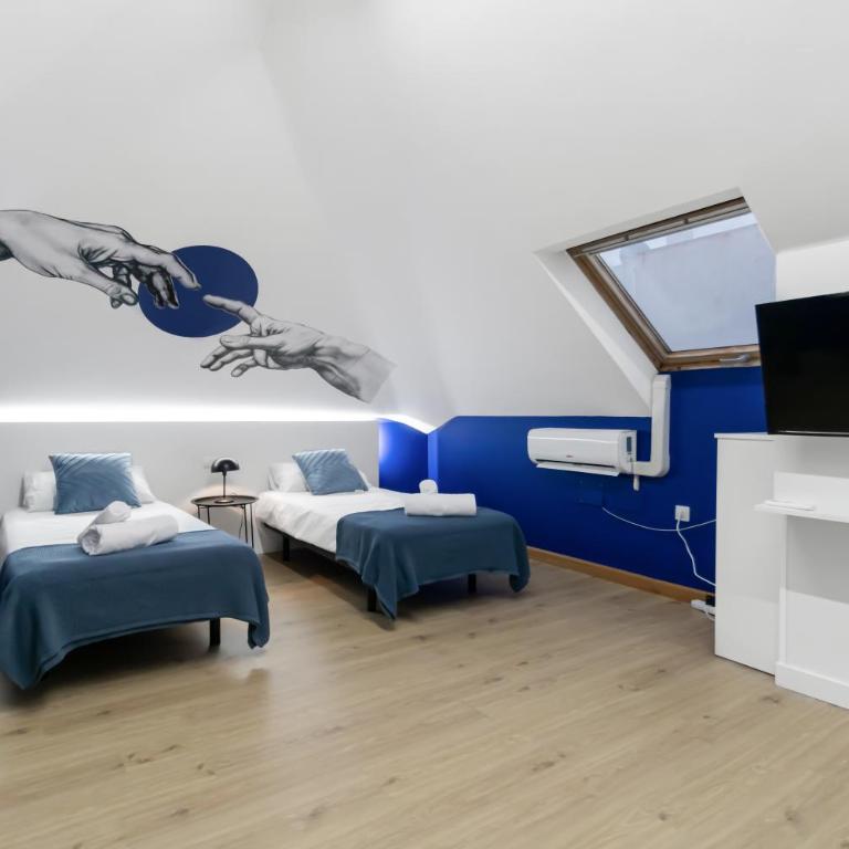 Large Attic Las Canteras Rooms - Only adults - Habitación Triple Deluxe - 1