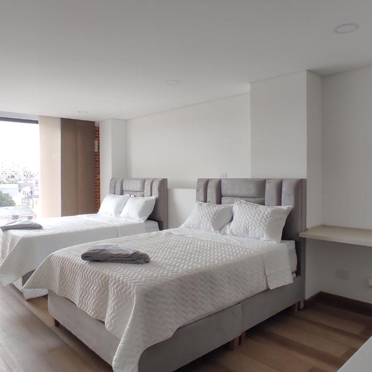 Modelia Living & Parking SAS - Apartamento - 3