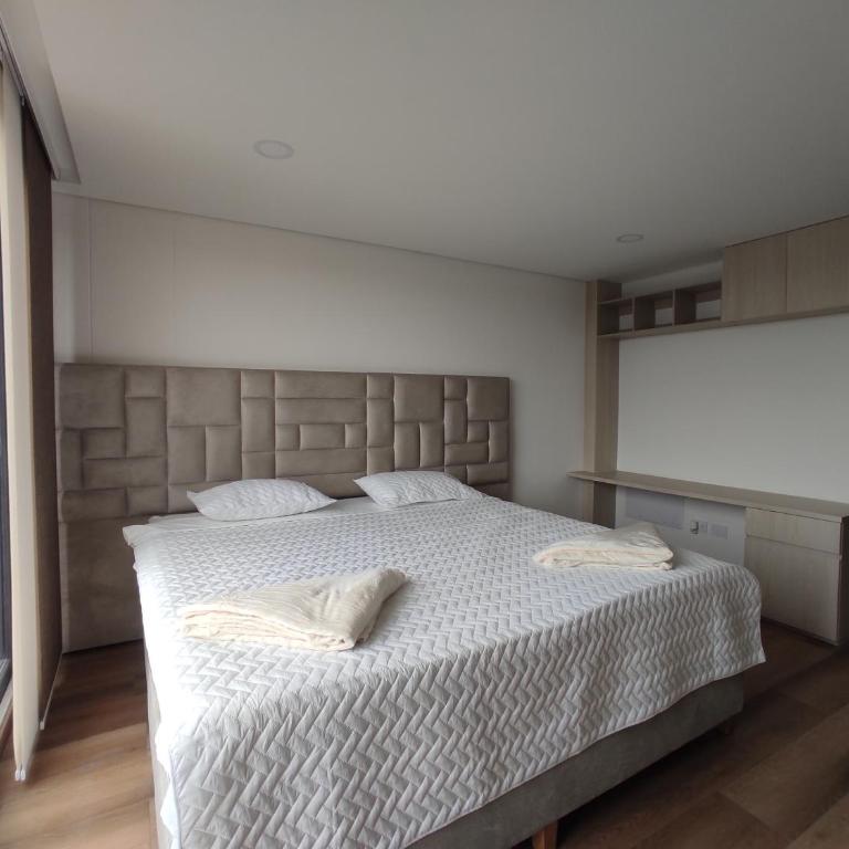 Modelia Living & Parking SAS - Apartamento - 1