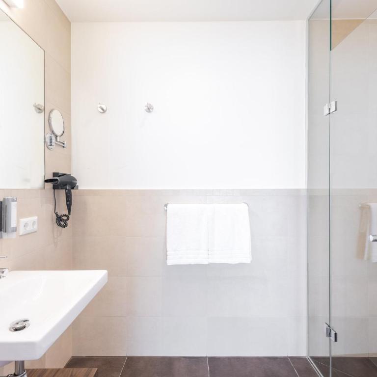 Garner Hotel Klagenfurt - Moser Verdino by IHG - Suite mit Queensize-Bett - 1