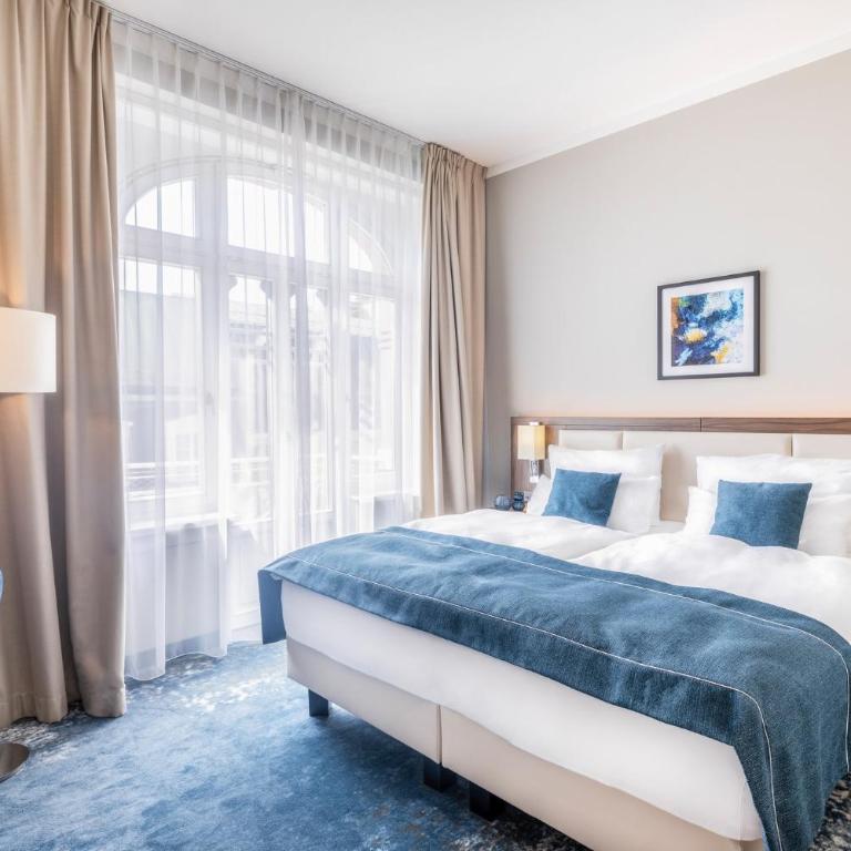 Garner Hotel Klagenfurt - Moser Verdino by IHG - Standard Zimmer mit Queensize-Bett - 1