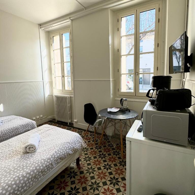 ALBI Chambres - Petite Chambre Double ou Lits Jumeaux - 1