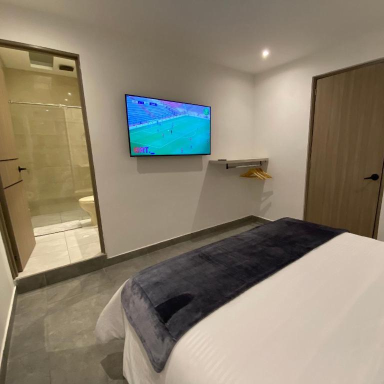 96K Premium Suite - Habitaciones Cerca al Aeropuerto en Bogotá - Suite con cama grande - 10