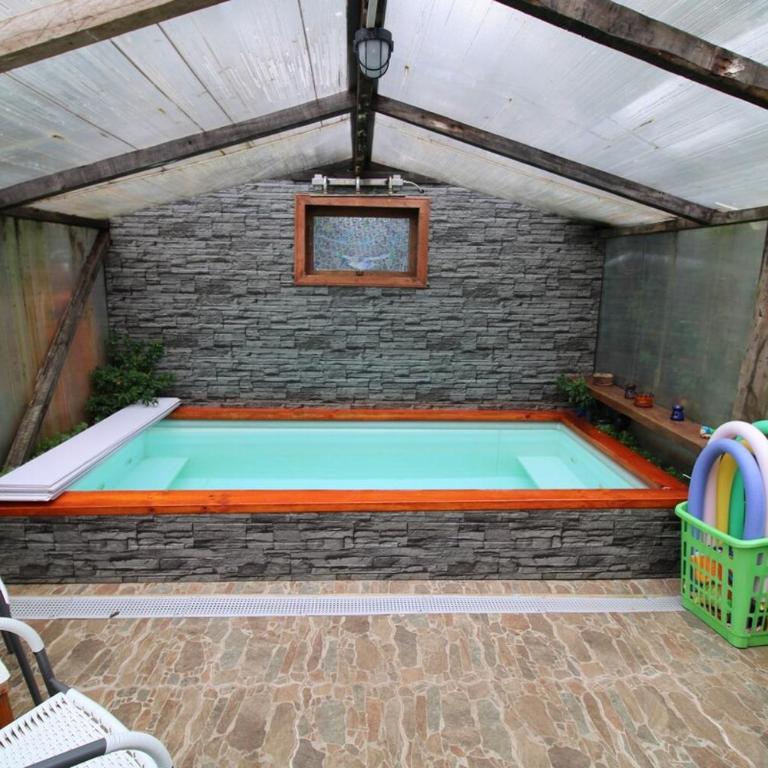 Habitación cocina y Quincho con Piscina temperada - Apartamento de 1 dormitorio - 9