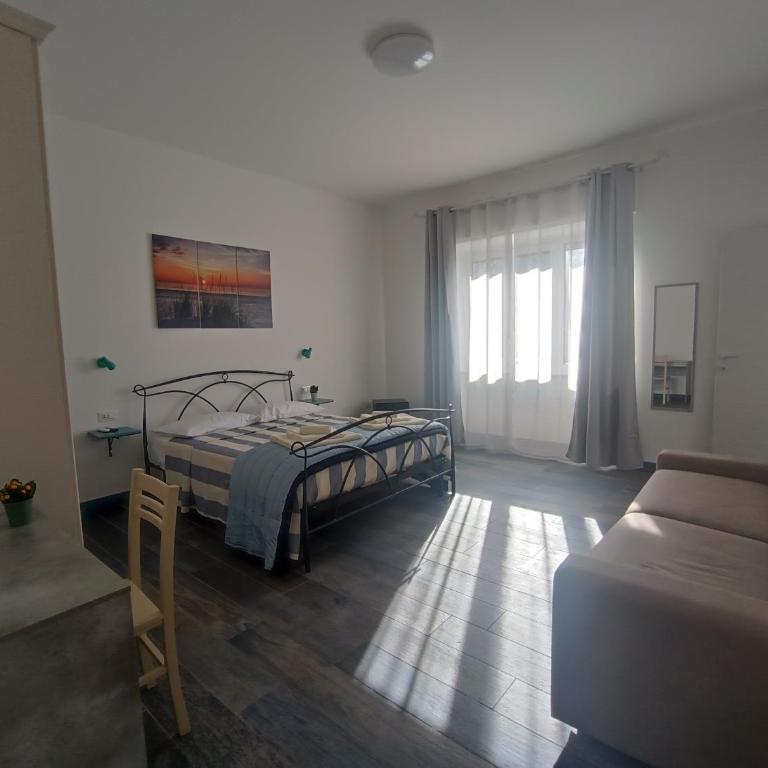 Porto Sicuro Hospitality - Camera Quadrupla con Balcone - 1