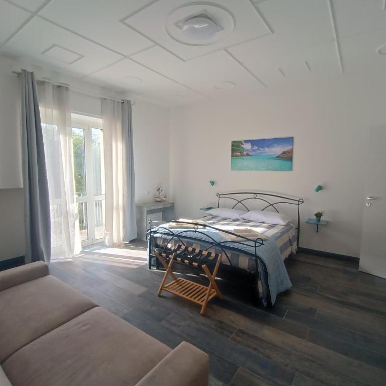 Porto Sicuro Hospitality - Camera Quadrupla con Balcone - 3
